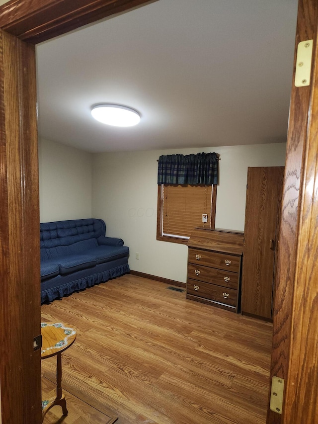 5747 E Clinton St, Albany, OH 45710 - living area featuring wood finished floors and baseboards