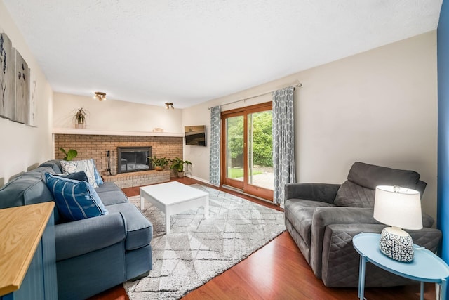 2862 Shady Ridge Dr, Columbus, OH 43231 - living area with wood finished floors and a brick fireplace