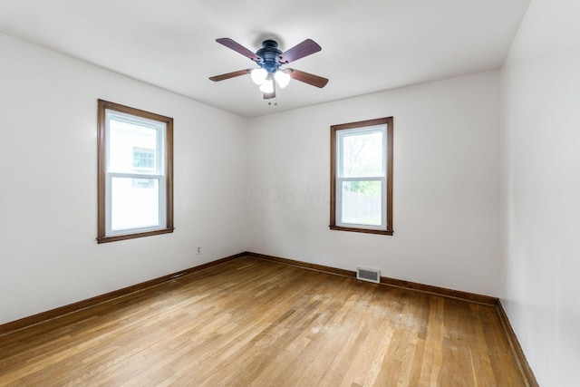 157 E Dominion Blvd, Columbus, OH 43214 - empty room with plenty of natural light, light wood-style floors, and baseboards