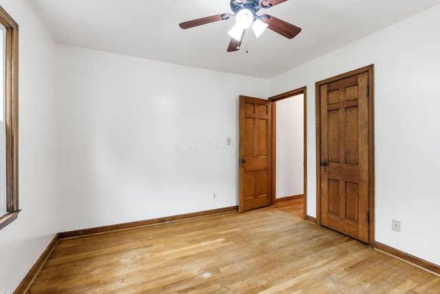 157 E Dominion Blvd, Columbus, OH 43214 - unfurnished bedroom featuring light wood-style flooring, baseboards, and ceiling fan