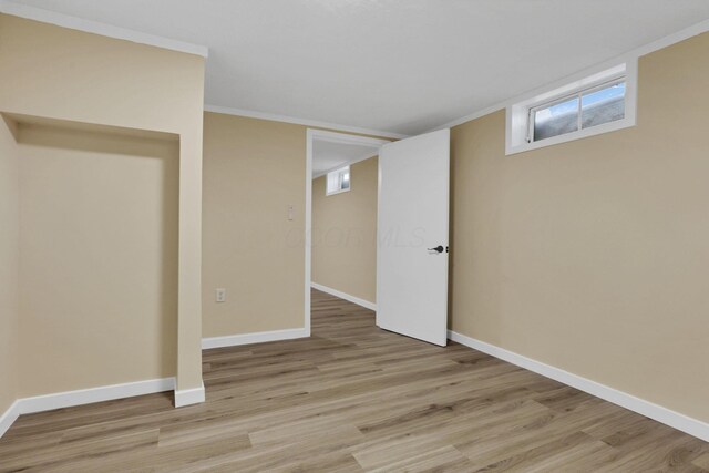 1783 Glenmar Dr, Lancaster, OH 43130 - below grade area with light wood-style floors and baseboards