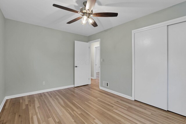 1783 Glenmar Dr, Lancaster, OH 43130 - unfurnished bedroom with baseboards, light wood-style floors, a closet, and ceiling fan
