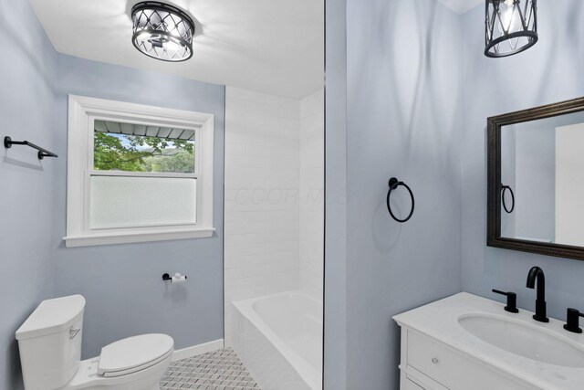 1783 Glenmar Dr, Lancaster, OH 43130 - bathroom featuring toilet, vanity, tile patterned flooring, and baseboards