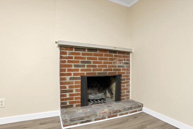 1783 Glenmar Dr, Lancaster, OH 43130 - detailed view of baseboards, wood finished floors, a fireplace, and ornamental molding
