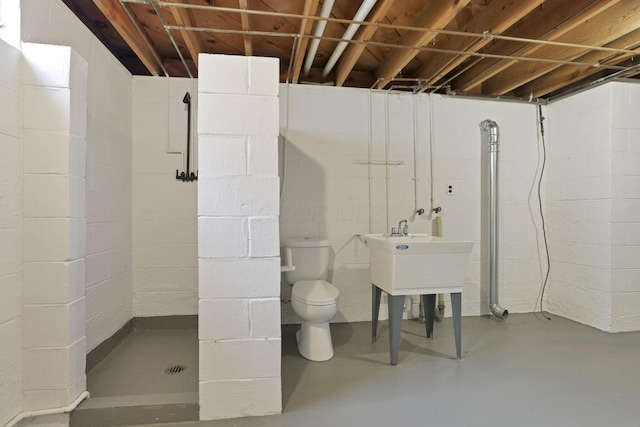 1783 Glenmar Dr, Lancaster, OH 43130 - unfinished basement with a sink and concrete block wall