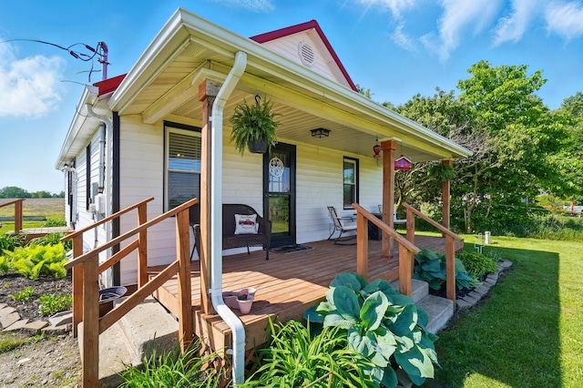 11725 Old Columbus Rd, South Vienna, OH 45369 - wooden deck featuring a yard