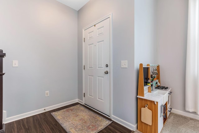 324 Raccoon Ave, Johnstown, OH 43031 - entryway with baseboards and dark wood-style floors