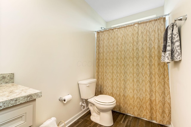 324 Raccoon Ave, Johnstown, OH 43031 - bathroom with wood finished floors, toilet, curtained shower, and baseboards