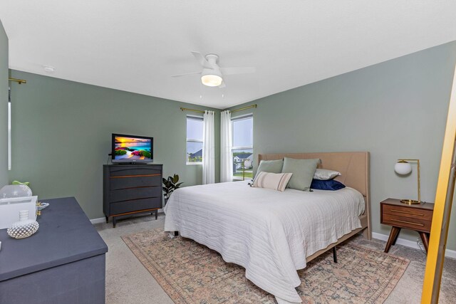 324 Raccoon Ave, Johnstown, OH 43031 - bedroom with light colored carpet, baseboards, and a ceiling fan