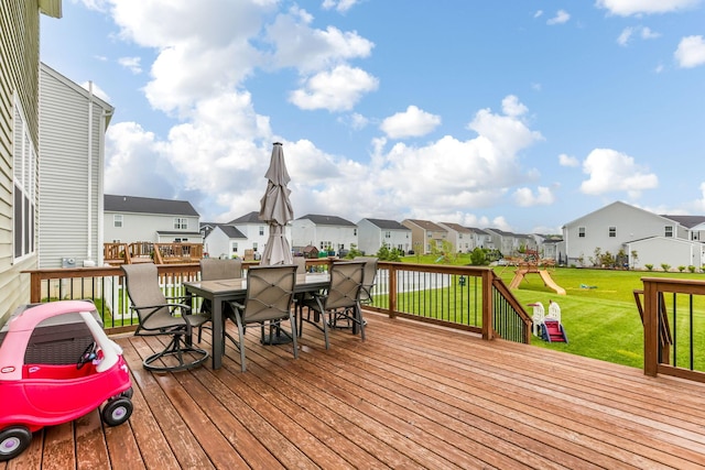 324 Raccoon Ave, Johnstown, OH 43031 - deck featuring a residential view, outdoor dining space, and a lawn