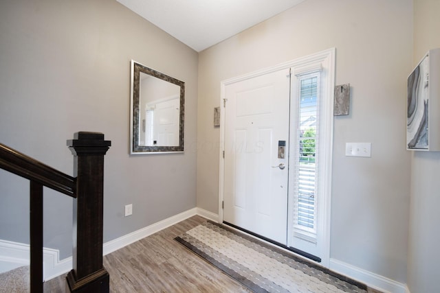 2991 Green Line Way, Columbus, OH 43231 - entryway featuring wood finished floors, baseboards, and stairs