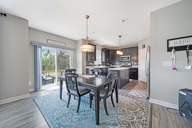 2991 Green Line Way, Columbus, OH 43231 - dining space featuring wood finished floors and baseboards