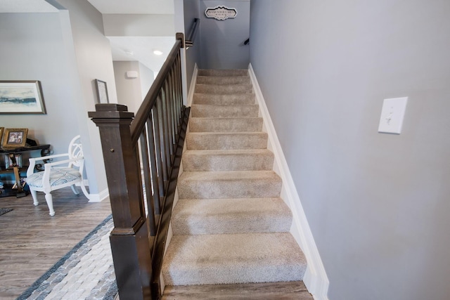 2991 Green Line Way, Columbus, OH 43231 - staircase with wood finished floors and baseboards