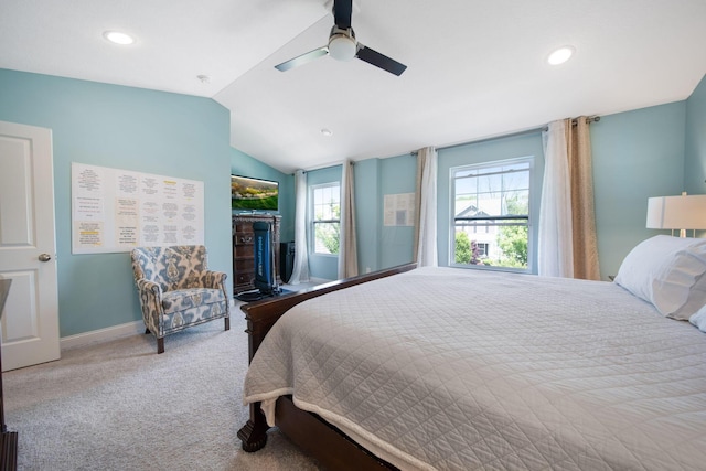 2991 Green Line Way, Columbus, OH 43231 - carpeted bedroom featuring multiple windows, vaulted ceiling, baseboards, a ceiling fan, and recessed lighting