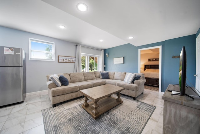2991 Green Line Way, Columbus, OH 43231 - living room featuring light marble finish flooring, recessed lighting, and baseboards