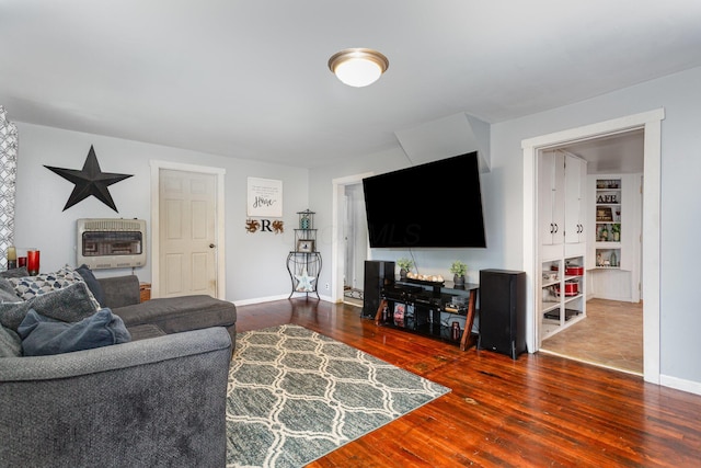 3470 State Route 314, Fredericktown, OH 43019 - living room featuring heating unit, hardwood / wood-style floors, and baseboards