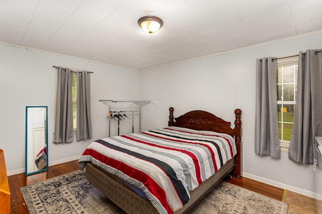 3470 State Route 314, Fredericktown, OH 43019 - bedroom with crown molding, wood finished floors, and baseboards
