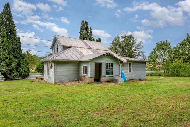 3470 State Route 314, Fredericktown, OH 43019 - rear view of house with a yard and metal roof