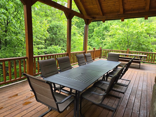 21760 State Route 93, Logan, OH 43138 - wooden deck featuring outdoor dining space and a view of trees