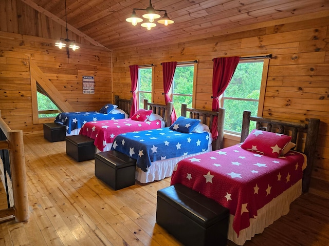 21760 State Route 93, Logan, OH 43138 - bedroom with hardwood / wood-style flooring, wood walls, multiple windows, vaulted ceiling, and wooden ceiling