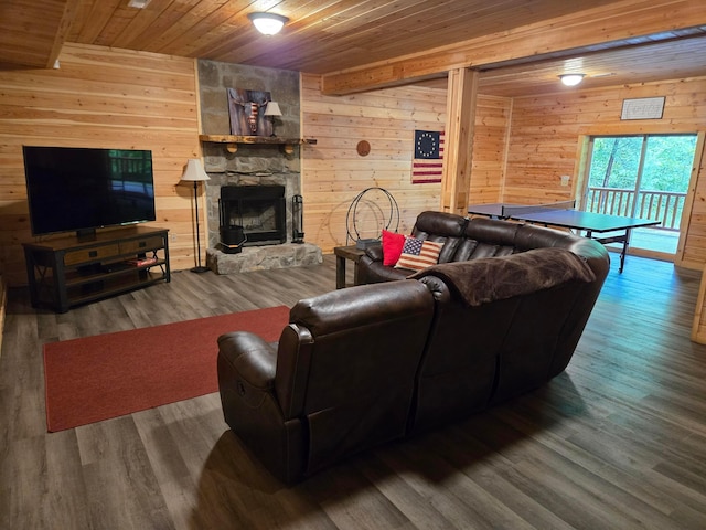 21760 State Route 93, Logan, OH 43138 - living room featuring wooden walls, wooden ceiling, wood finished floors, and a fireplace
