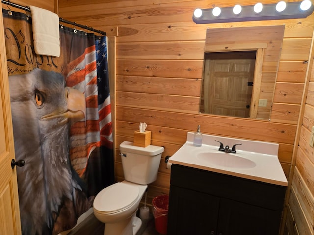 21760 State Route 93, Logan, OH 43138 - bathroom featuring wooden walls, vanity, toilet, and curtained shower