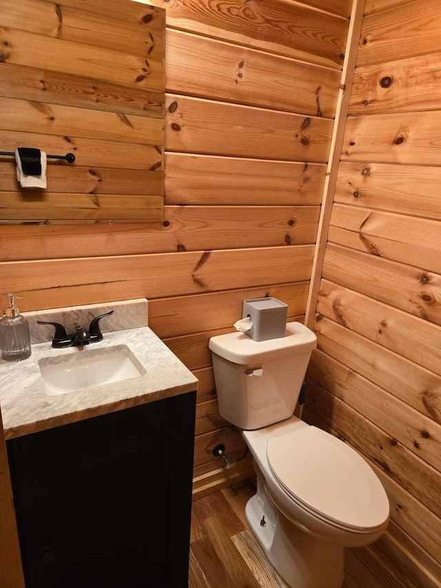 21760 State Route 93, Logan, OH 43138 - bathroom with toilet, vanity, and wood finished floors