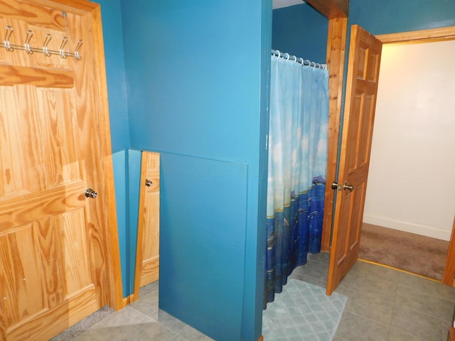 21800 State Route 47, West Mansfield, OH 43358 - bathroom featuring tile patterned floors, baseboards, and a shower with curtain