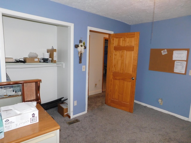 21800 State Route 47, West Mansfield, OH 43358 - bedroom with carpet, a textured ceiling, and baseboards