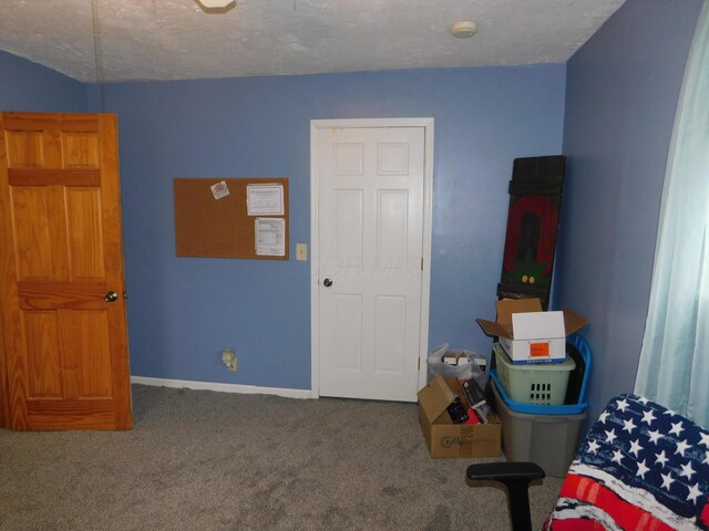 21800 State Route 47, West Mansfield, OH 43358 - carpeted bedroom with a textured ceiling and baseboards