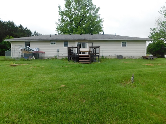21800 State Route 47, West Mansfield, OH 43358 - rear view of property with a deck, a yard, and central air condition unit