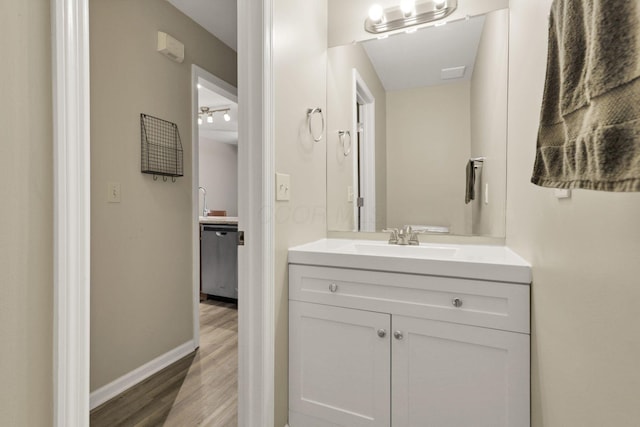 4832 Bay Grove Ct, Groveport, OH 43125 - bathroom with vanity, wood finished floors, and baseboards
