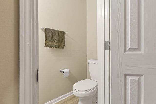4832 Bay Grove Ct, Groveport, OH 43125 - bathroom with toilet, wood finished floors, and baseboards