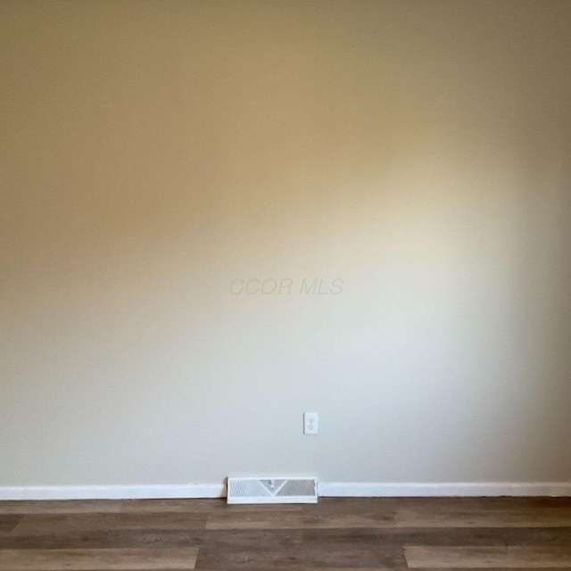 2363 Hampstead Dr Unit 2363-65-67, Columbus, OH 43229 - unfurnished room featuring baseboards and dark wood finished floors
