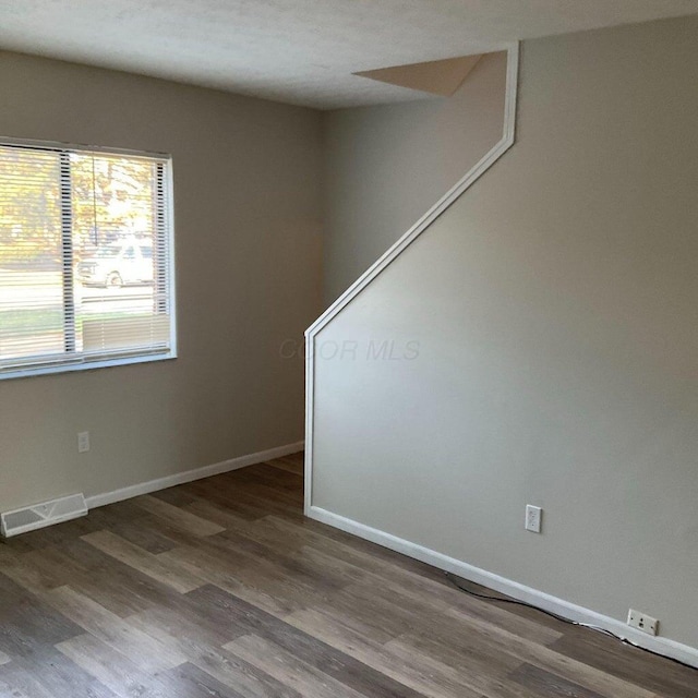 2363 Hampstead Dr Unit 2363-65-67, Columbus, OH 43229 - empty room featuring wood finished floors and baseboards