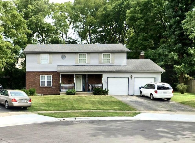 406 Worman Dr, Columbus, OH 43230 - traditional home with covered porch, a garage, asphalt driveway, a front lawn, and brick siding