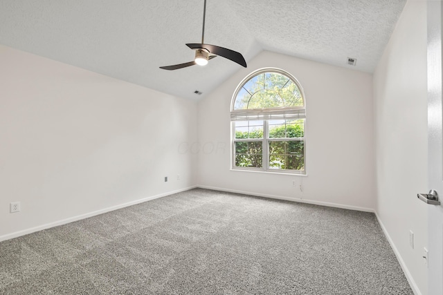 143 Falls Peak Ln, Delaware, OH 43015 - carpeted spare room featuring a ceiling fan, vaulted ceiling, a textured ceiling, and baseboards