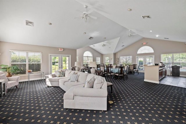 143 Falls Peak Ln, Delaware, OH 43015 - living room featuring carpet, ceiling fan, lofted ceiling, french doors, and baseboards