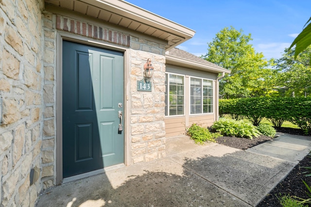 143 Falls Peak Ln, Delaware, OH 43015 - property entrance featuring stone siding