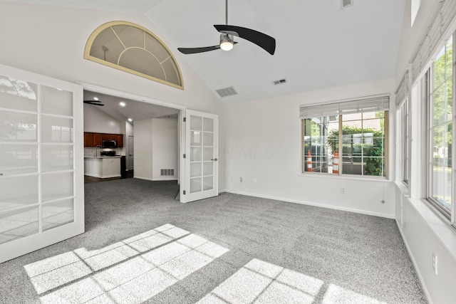 143 Falls Peak Ln, Delaware, OH 43015 - carpeted empty room with french doors, ceiling fan, high vaulted ceiling, and baseboards