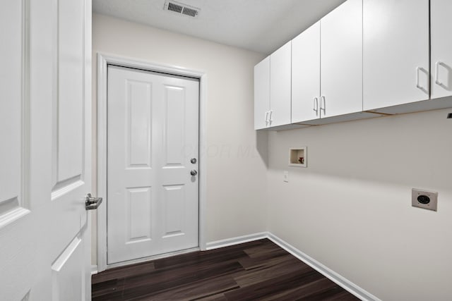 143 Falls Peak Ln, Delaware, OH 43015 - washroom featuring hookup for an electric dryer, cabinet space, dark wood-style floors, baseboards, and washer hookup