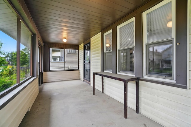 1146 Walters St, Columbus, OH 43201 - unfurnished sunroom featuring concrete flooring