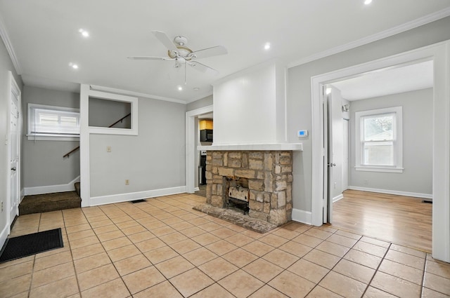 1146 Walters St, Columbus, OH 43201 - unfurnished living room featuring a ceiling fan, ornamental molding, stairs, recessed lighting, and light tile patterned floors