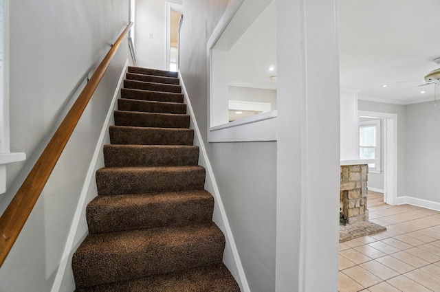 1146 Walters St, Columbus, OH 43201 - stairway featuring crown molding, ceiling fan, baseboards, tile patterned flooring, and recessed lighting