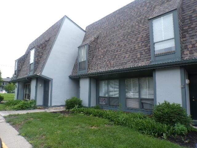 1022 Galliton Ct Unit C, Columbus, OH 43220 - view of side of property featuring stucco siding