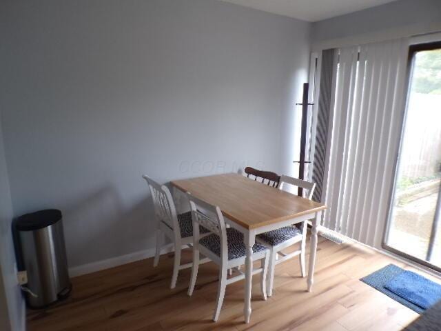 1022 Galliton Ct Unit C, Columbus, OH 43220 - dining space with wood finished floors and baseboards