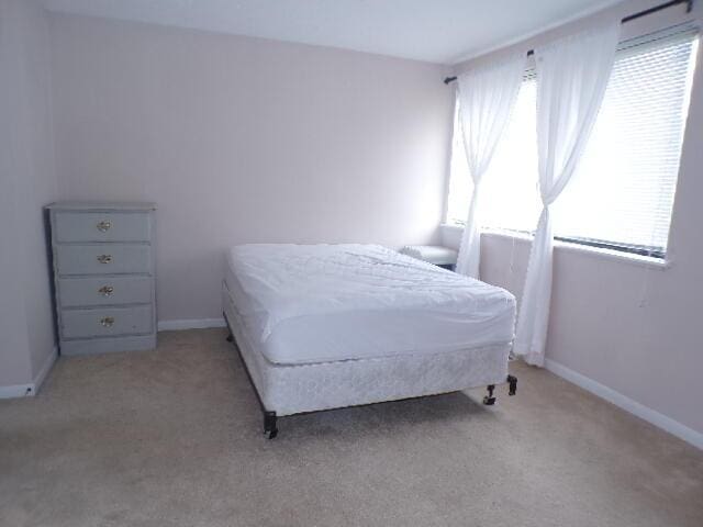 1022 Galliton Ct Unit C, Columbus, OH 43220 - carpeted bedroom with baseboards