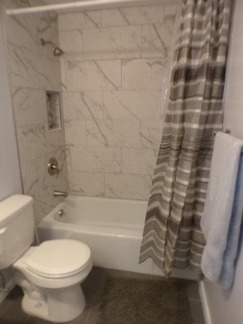1022 Galliton Ct Unit C, Columbus, OH 43220 - full bathroom featuring shower / bath combo with shower curtain and toilet
