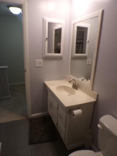 1022 Galliton Ct Unit C, Columbus, OH 43220 - bathroom featuring toilet, vanity, and tile patterned flooring