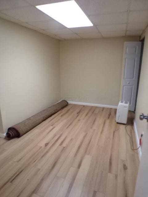 1022 Galliton Ct Unit C, Columbus, OH 43220 - spare room with light wood-type flooring, a drop ceiling, and baseboards